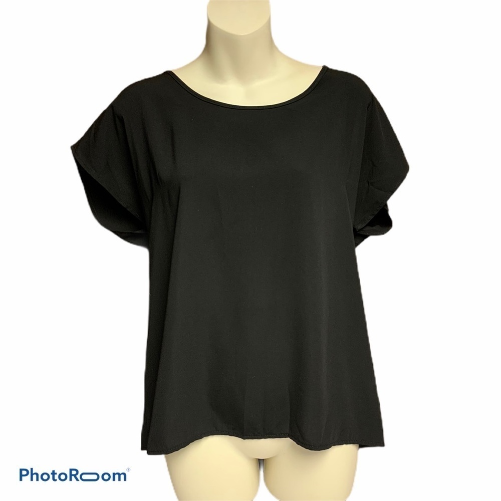 Francesca’s black back zippered top S